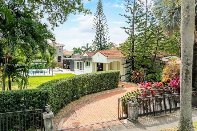 view of home's community featuring a pool