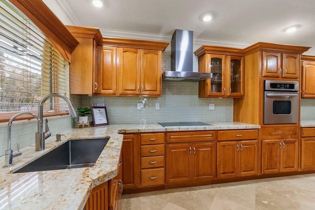 kitchen with sink, oven, ornamental molding, black electric cooktop, and wall chimney exhaust hood