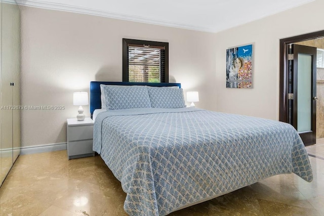 bedroom with ornamental molding