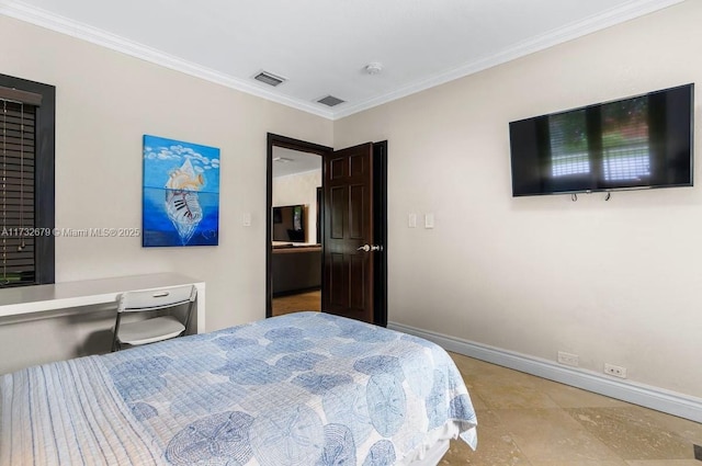 bedroom with ornamental molding