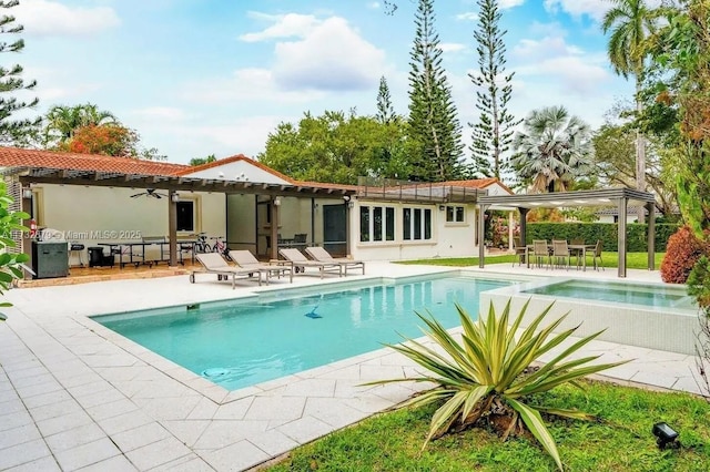 view of pool featuring ceiling fan and a patio area