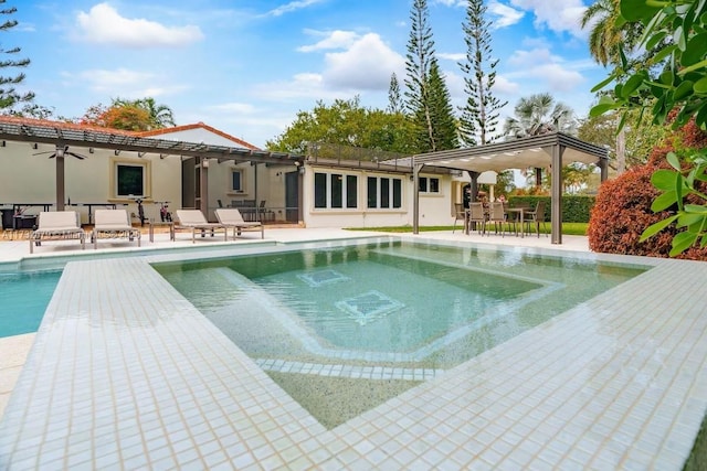 view of pool featuring a patio and ceiling fan