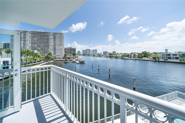 balcony featuring a water view