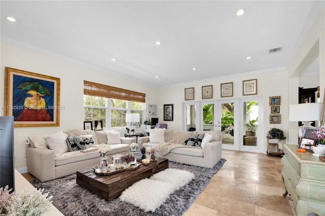 living room with crown molding and french doors