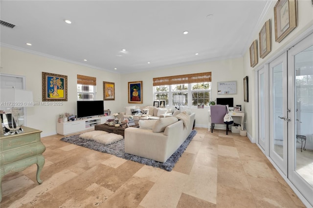 living room featuring french doors and ornamental molding