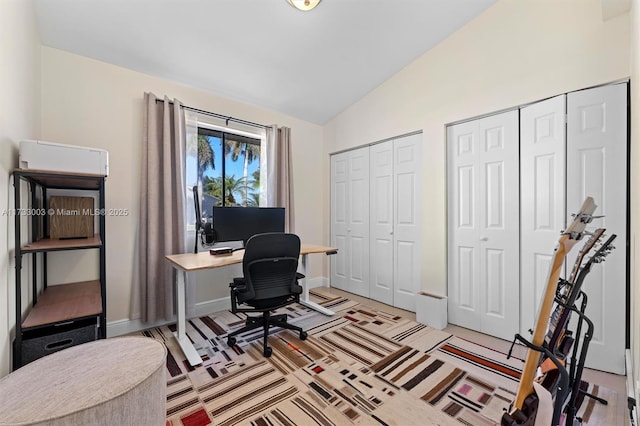 office space with lofted ceiling