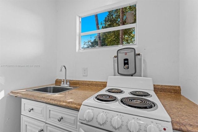 kitchen with white cabinetry, white electric stove, and sink