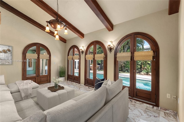 225 Alesio Ave, Coral Gables, FL 33134 - living room featuring french doors, marble finish floor, arched walkways, and vaulted ceiling with beams