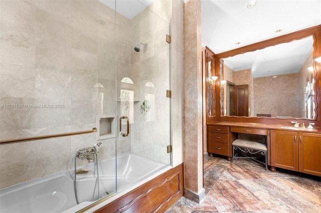 full bath featuring shower / bath combination with glass door and vanity