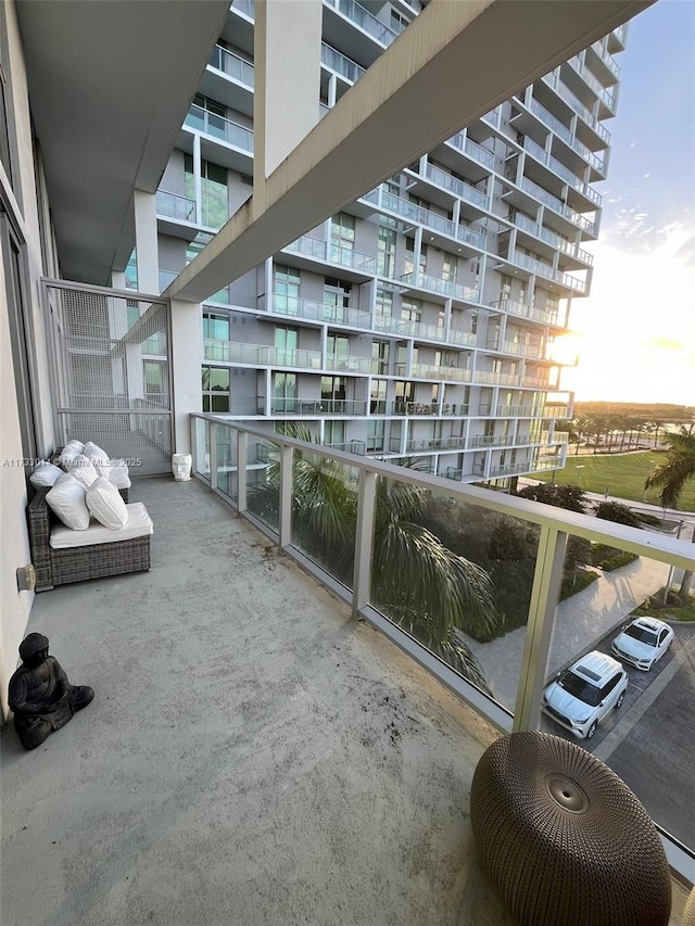 view of balcony at dusk