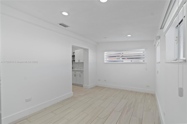 empty room featuring light hardwood / wood-style flooring