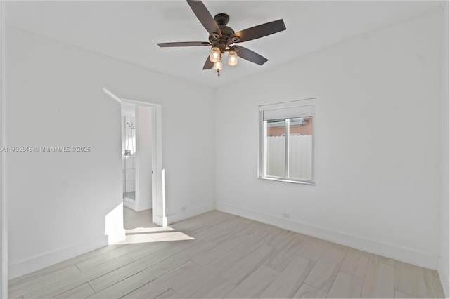 unfurnished room featuring ceiling fan and light hardwood / wood-style floors