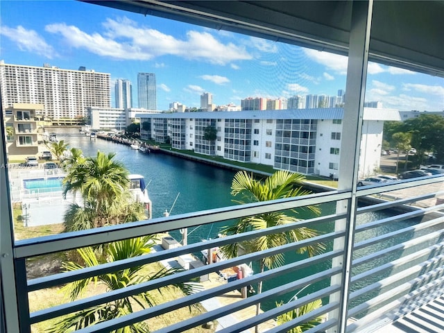 balcony featuring a water view