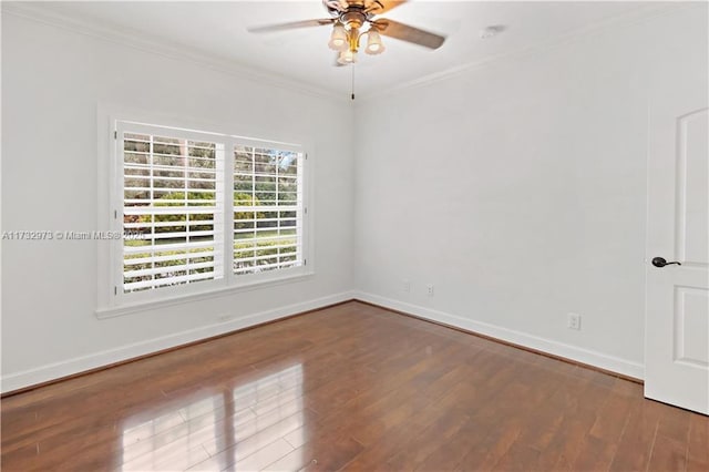 unfurnished room featuring ornamental molding, ceiling fan, baseboards, and wood finished floors