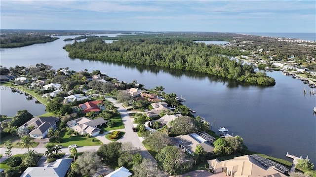 aerial view with a residential view and a water view