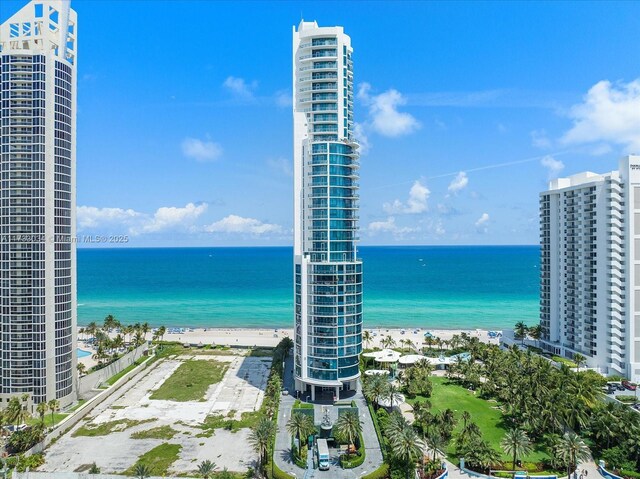 view of water feature with a beach view