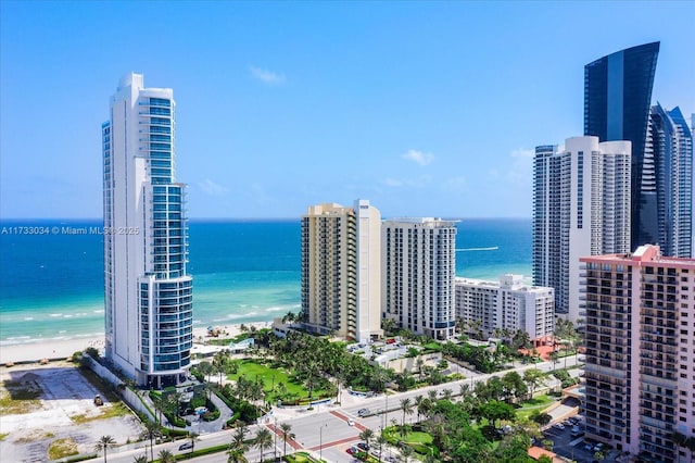 view of city with a view of the beach and a water view