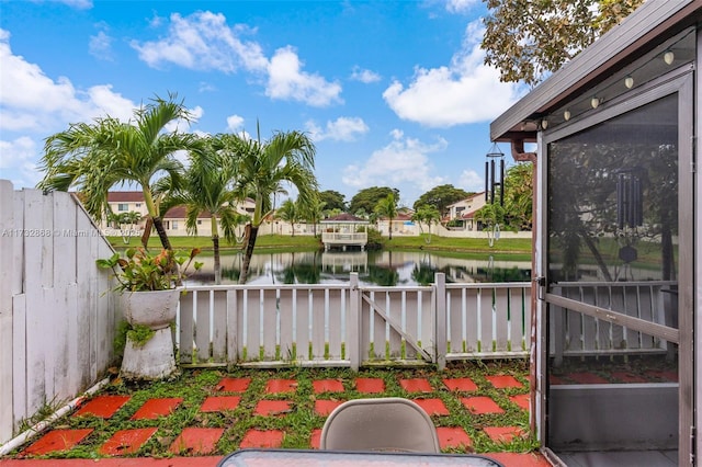 view of patio featuring a water view