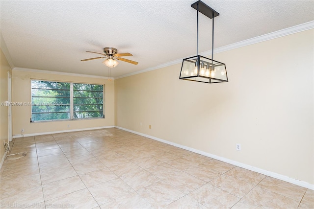 spare room with crown molding and a textured ceiling