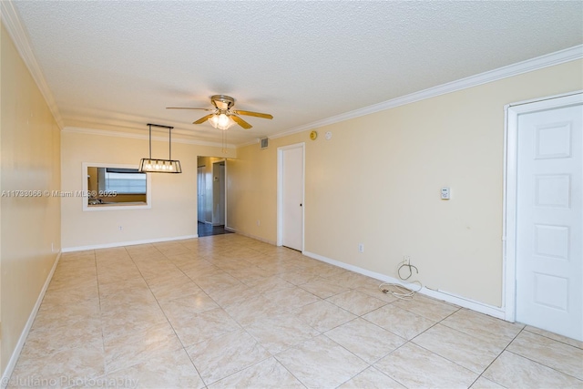 tiled spare room with crown molding, a textured ceiling, and ceiling fan