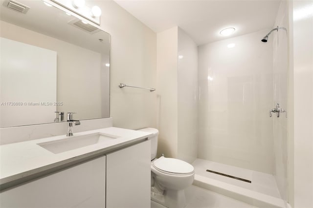full bathroom featuring toilet, visible vents, walk in shower, and vanity