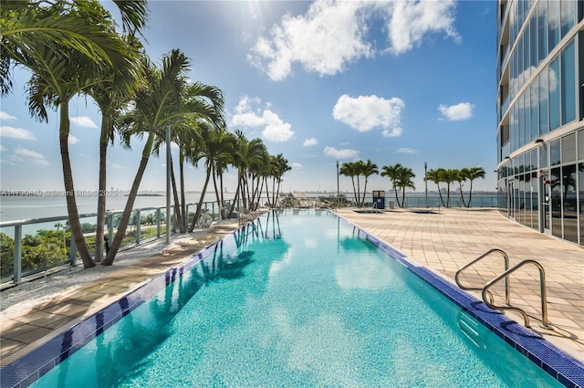 community pool with a water view
