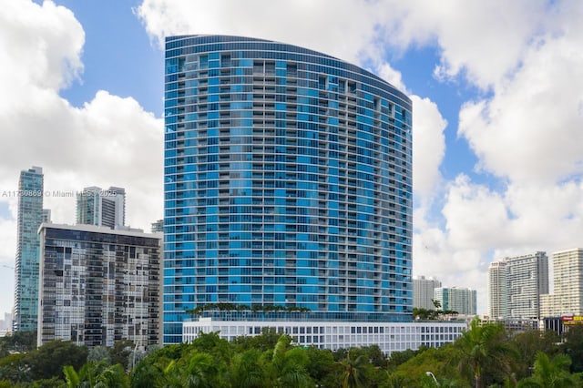 view of property with a city view