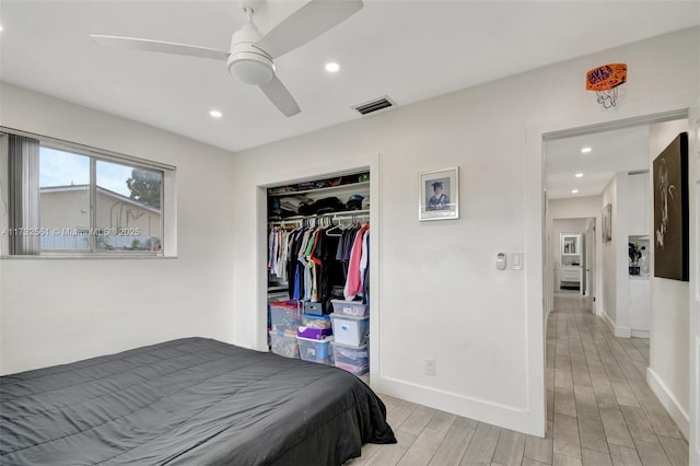 bedroom featuring a closet and ceiling fan