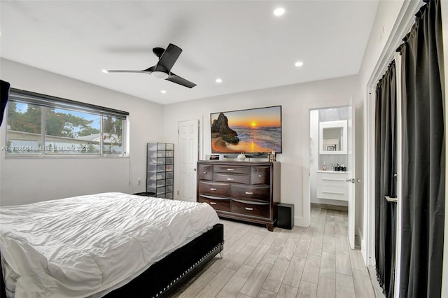 bedroom featuring ceiling fan and light hardwood / wood-style floors