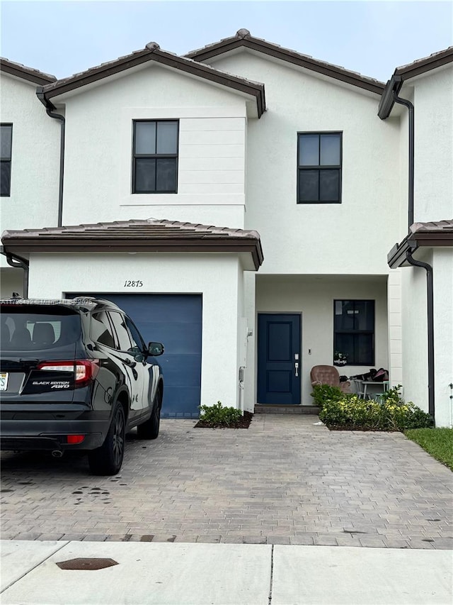 view of front of home with a garage