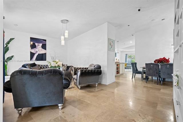 living room with lofted ceiling