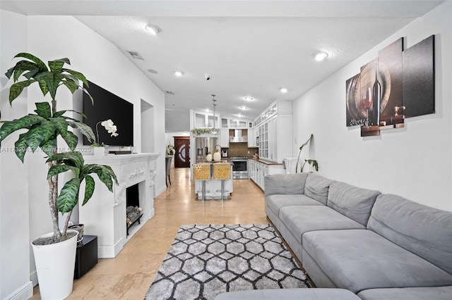 tiled living room with vaulted ceiling