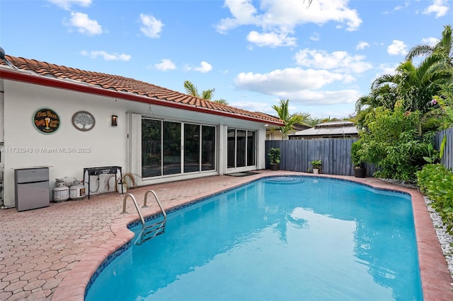 view of pool with a patio