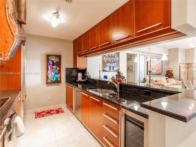 kitchen featuring light tile patterned flooring, dark stone counters, beverage cooler, and sink