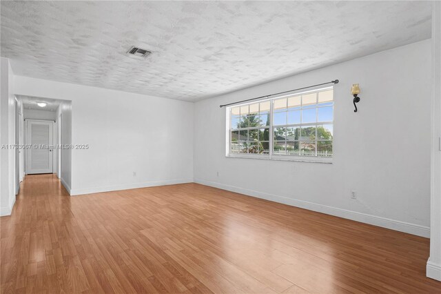 dining room featuring hardwood / wood-style flooring and a chandelier