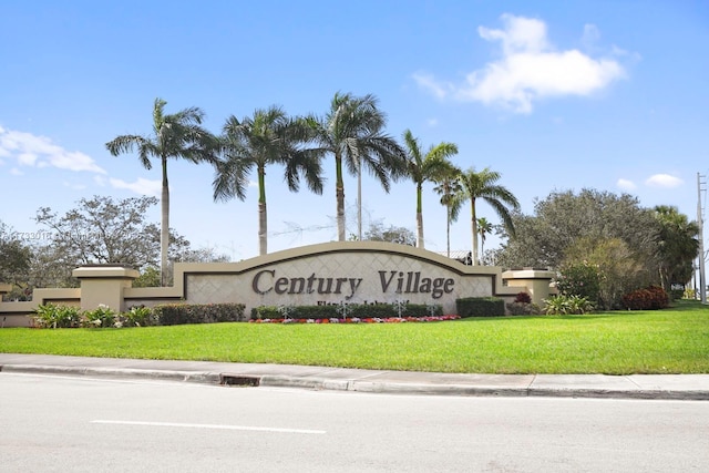 community sign with a lawn