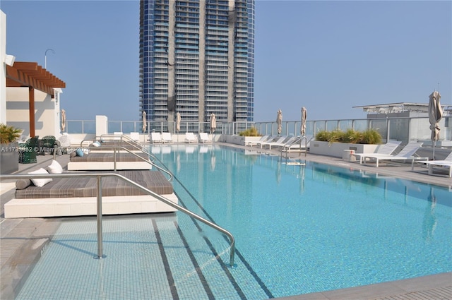 view of pool featuring a patio