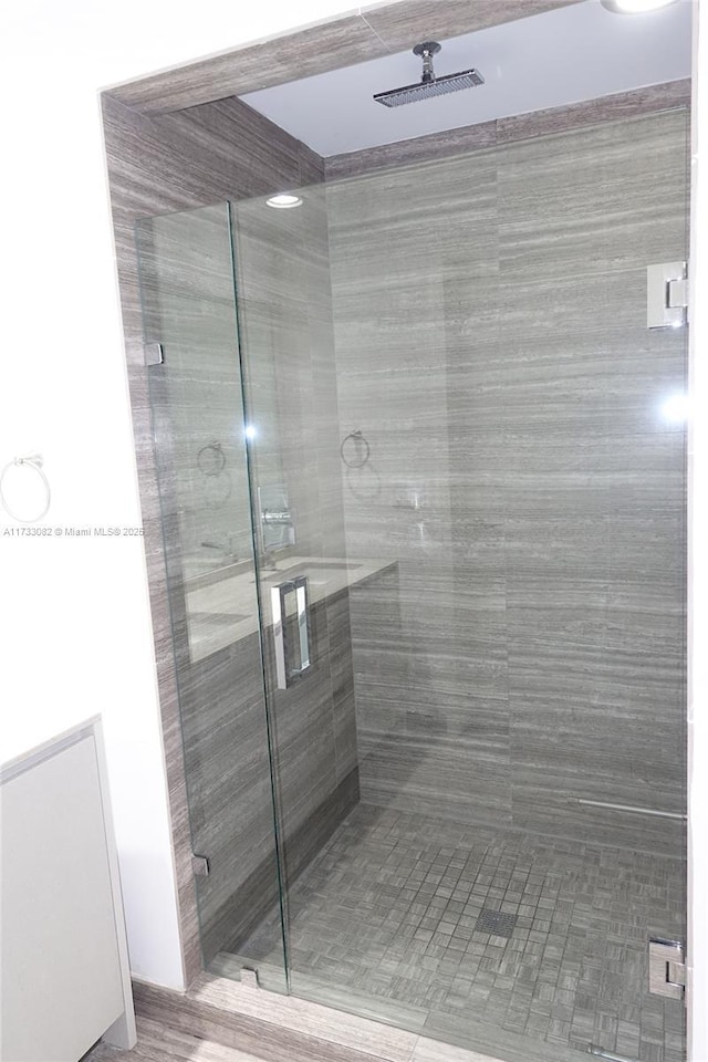 bathroom with an enclosed shower