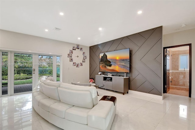 living room with wine cooler, french doors, and indoor bar