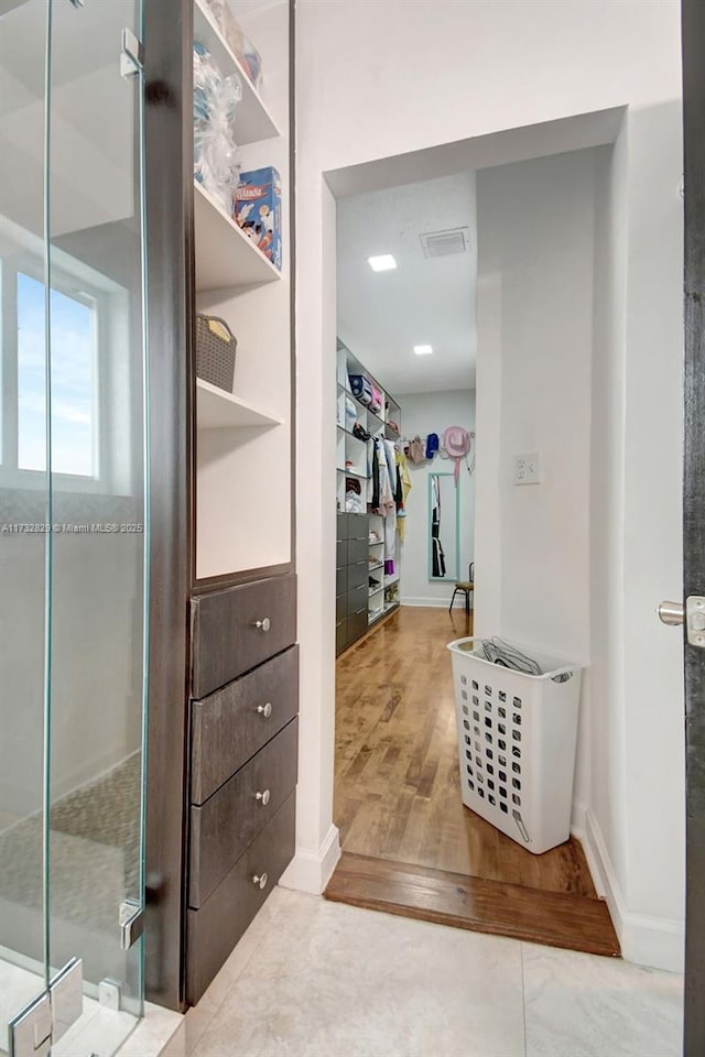 bedroom with wood-type flooring and ceiling fan