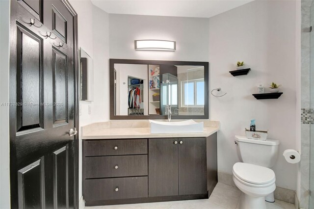 spacious closet featuring hardwood / wood-style flooring