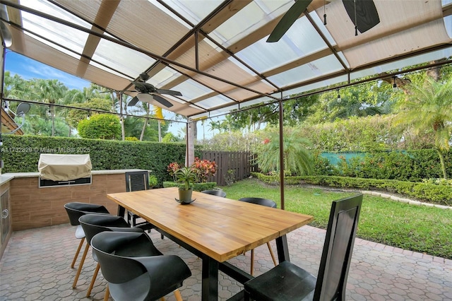 view of patio featuring ceiling fan and french doors