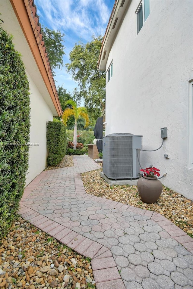 view of patio / terrace featuring central AC unit