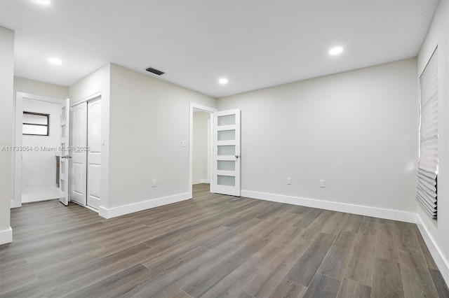 interior space with hardwood / wood-style floors