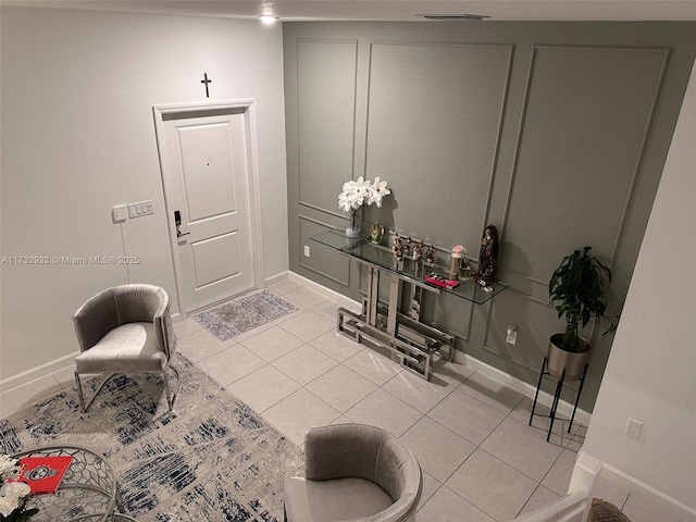 entryway featuring light tile patterned floors