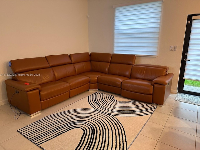 living room with light tile patterned flooring