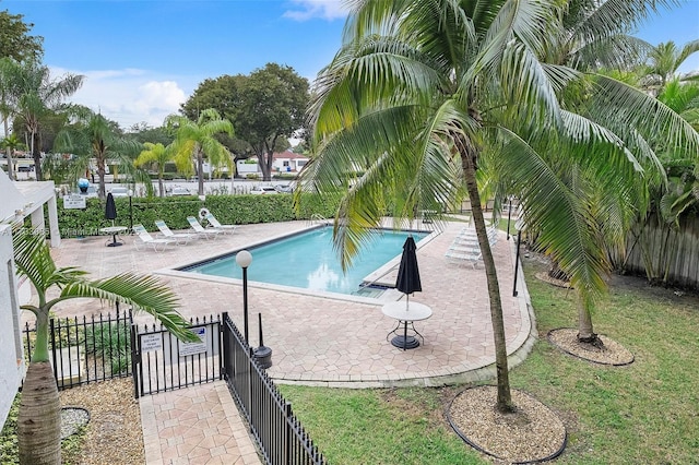 2160 SW 16th Ave Unit 212, Miami, FL 33145 - community pool featuring a patio and fence