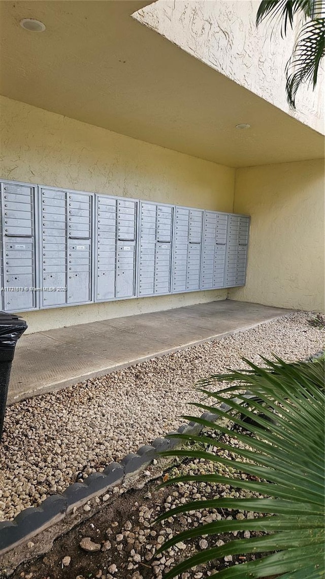 view of home's community with mail area