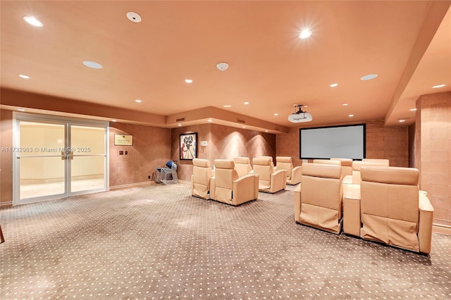 home theater with light carpet