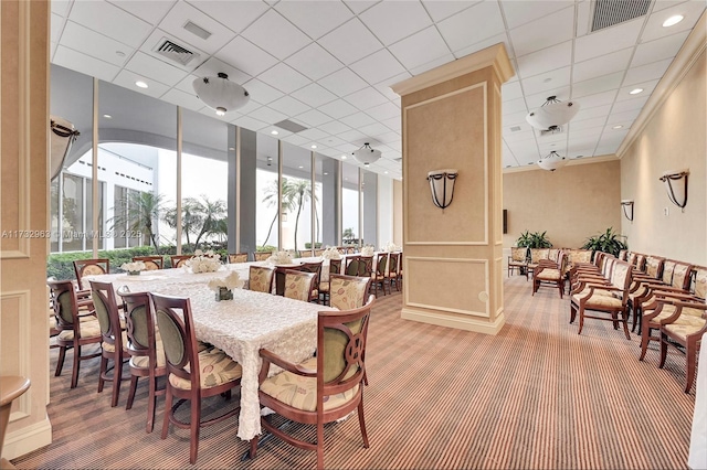 dining space featuring carpet flooring